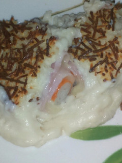 Una foto de Rollitos de york, queso y surimi gratinados