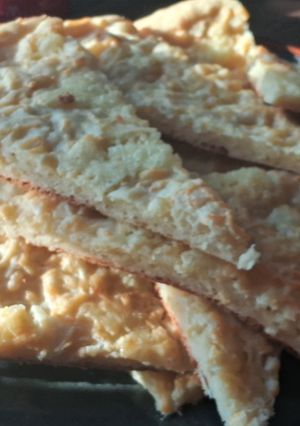 Una foto de Fainá de queso y muzarella
