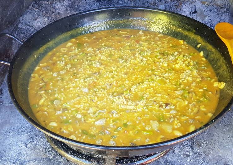 Arroz caldoso con gurumelos, lagarto ibérico y trigueros