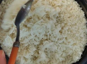 Una foto de Arroz preparado en arrocera exquisito!!!