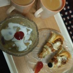 A picture of Chana chaat with tea.