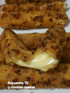 Una foto de Palitos de queso con un toque a bacon