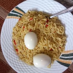 A picture of Noddle's with boiled egg.