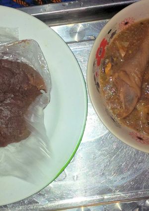A picture of Amala(yam flour) and Dried okro soup.