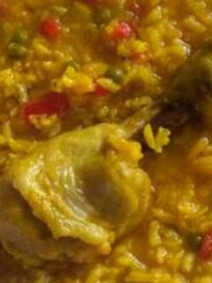 Una foto de Arroz caldoso con muslos de pollo