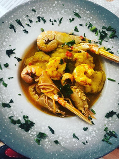Una foto de Guisado de rape con cigalas y patatas