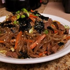 A picture of Japchae (Korean Glass Noodles).