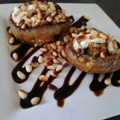 A picture of Garlic Mushrooms with Goats Cheese & Pine Nuts.
