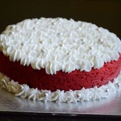 A picture of Eggless red velvet cake in pressure cooker.
