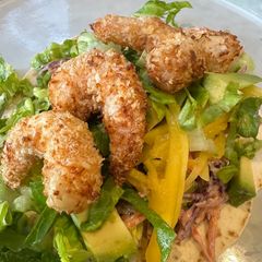 A picture of Crispy Prawn Tacos with Smoky Slaw.