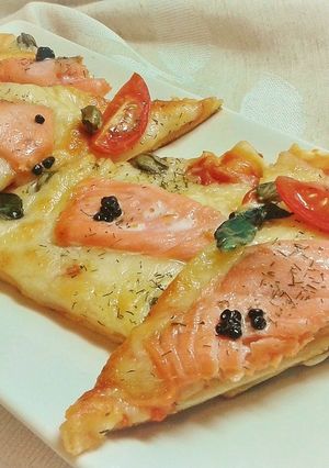 Una foto de Pizza de salmón