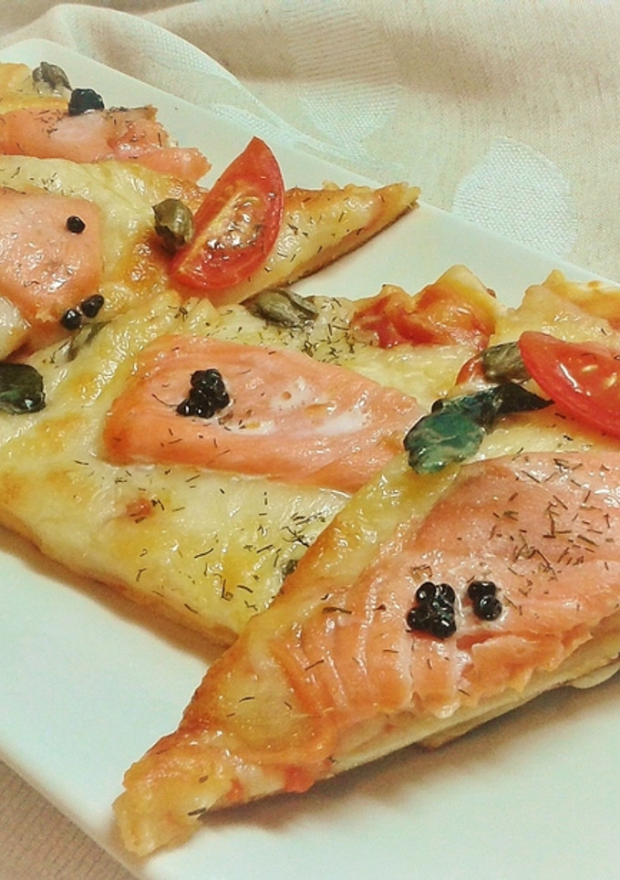 Una foto de Pizza de salmón