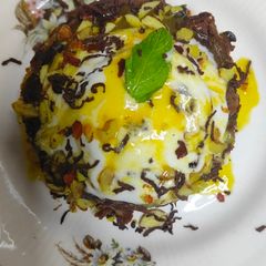 A picture of Passion fruit brownie with passion fruit sauce.