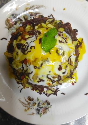 A picture of Passion fruit brownie with passion fruit sauce.