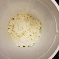 A picture of Homemade ricotta cheese.