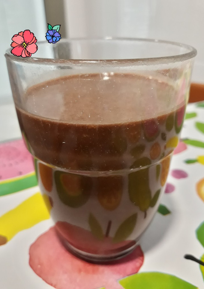 Una foto de Batido de bebida v. de avena con cacao, nueces y plátano