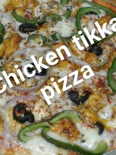 A picture of Chicken tikka pizza.