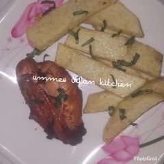 A picture of Fried yam with fried chicken.
