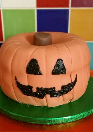 A picture of Vickys Halloween Pumpkin Piñata Cake, Decorating Idea.