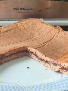 Una foto de Bizcocho Fit de avena con proteína Brownie y chocolate 99%