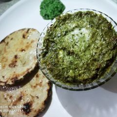 A picture of Sarso Saag with Besan Roti.