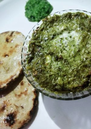 A picture of Sarso Saag with Besan Roti.