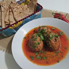 Vegetable Kofta with chapati A picture of Vegetable Kofta with chapati.