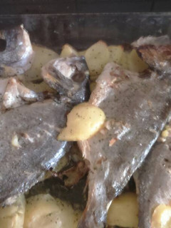 Una foto de Dorada al horno a mi estilo