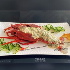 A picture of Oven Baked Rock Lobster with Truffle Seasoning Sauce.