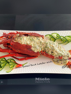 A picture of Oven Baked Rock Lobster with Truffle Seasoning Sauce.