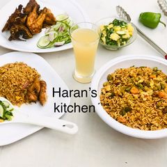 A picture of Chinese fried rice with Russian salad and grilled chicken.