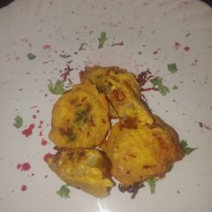 A picture of Stuffed lauki pakauda.