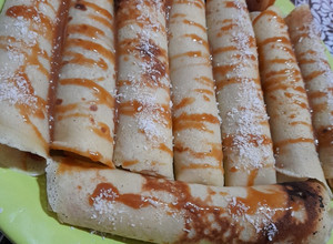 Una foto de Panqueques con dulce de leche