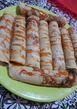 Una foto de Panqueques con dulce de leche