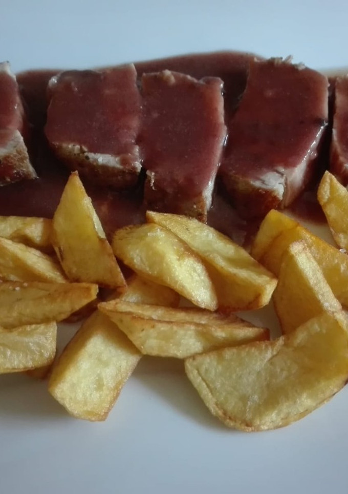 Una foto de Lomo de cerdo al Pedro Jiménez