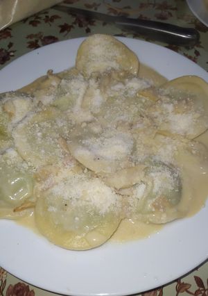 Una foto de Sorrentinos de espinaca y ricota con salsa Carusso