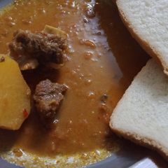 A picture of Aalo gosht salan.