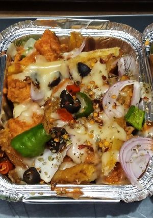 A picture of Chessy pizza fries.