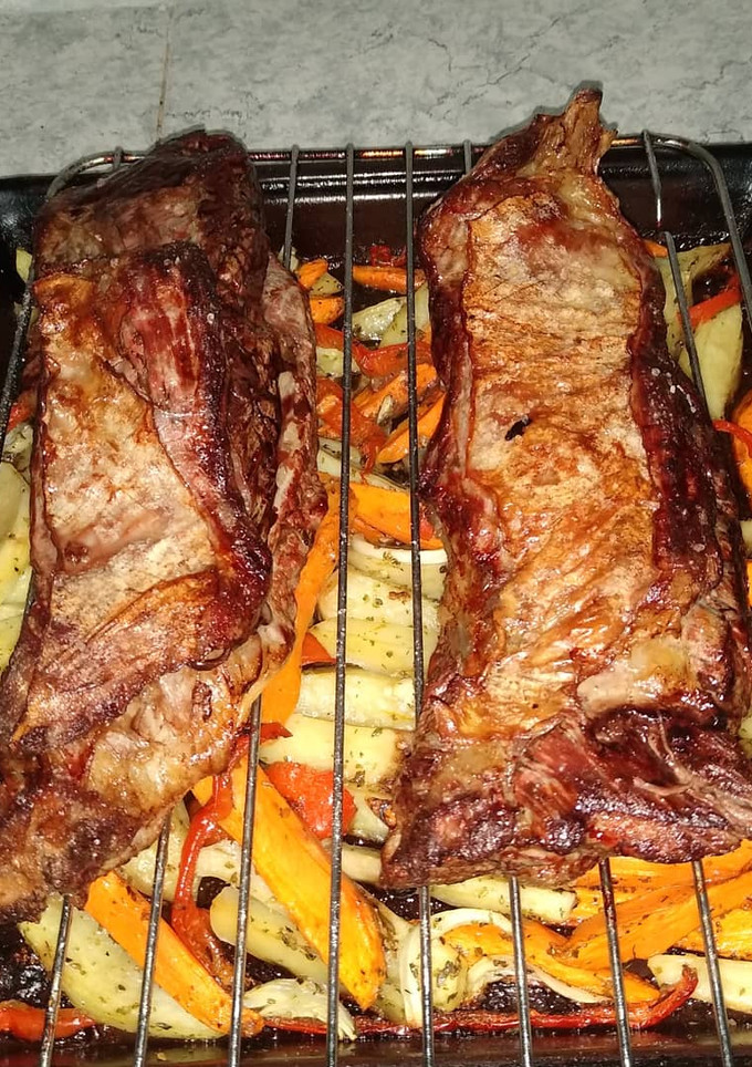 Una foto de Vacío al horno con papas