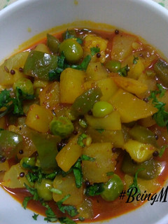 A picture of Sweet potato bottlegourd peas and capsicum sabji.