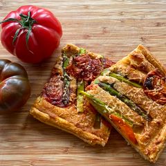 Sparrow Grass, Tomato and Pesto Custard Tart A picture of Sparrow Grass, Tomato and Pesto Custard Tart.