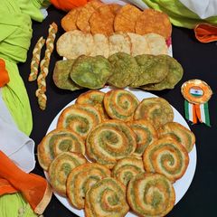 A picture of Tricolor crispy pinwheel poori.