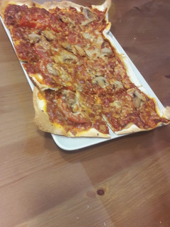 Una foto de Pizza con champiñones