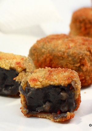 Foto principal de Croquetas de chipirones en su tinta