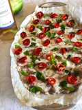 Carpaccio di Ombrina con pomodorini al forno