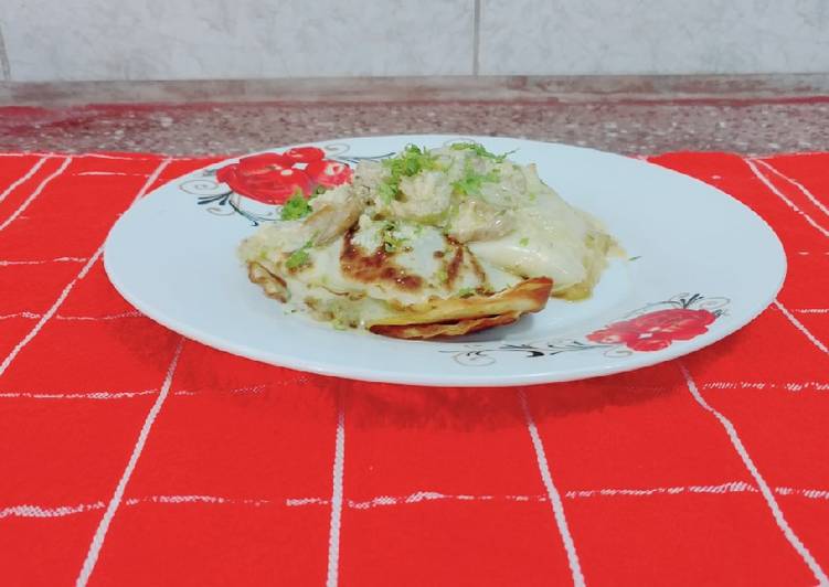 Crepes de acelga y carne con salsa gratén