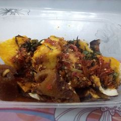 A picture of Roasted Yam and ponmo(cow skin)sauce ll.
