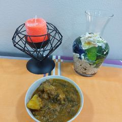 A picture of Mutton potato with spinach.