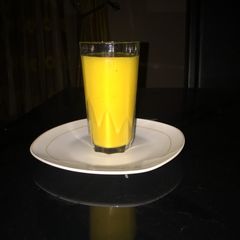 A picture of Mango and pineapple smoothie.