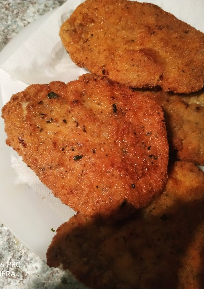 Una foto de Chuletas de cerdo empanadas